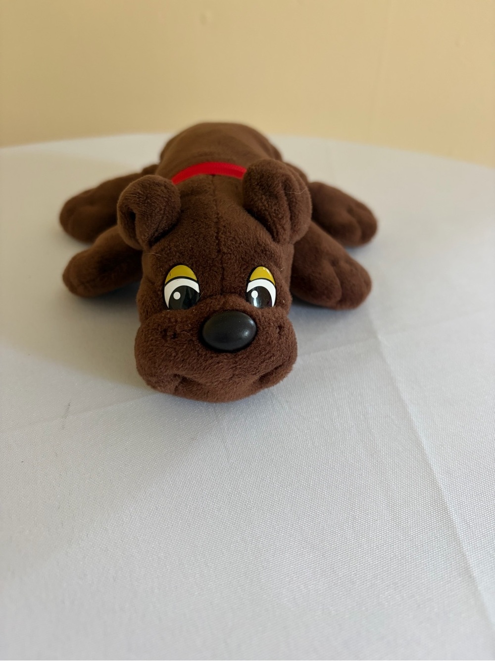 Pound Puppies  Brown Plush Dog Toy with Red Collar and Yellow-Accented Eyes
